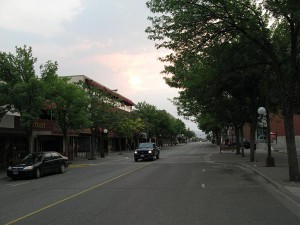 The main street in Kamloops. You  can see the smoke from the fires around the sun.